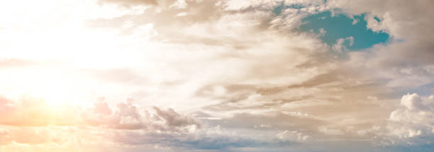istock sky with bright sunset (sunrise) and light clouds. Wide photo. 1413293226