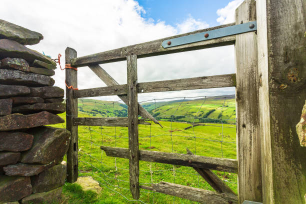 istock A rickety old farm gate pulled close with orange twine in Swaledale, Yorkshire Dales, UK leading off the high road from Askrigg to Gunnerside over grouse moorland into lush green pastures 1413294691