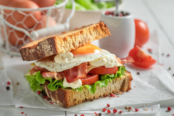 Homemade and crunchy toasted sandwich as classical breakfast.