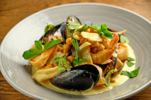 istock Salad with mussels vegetables 1413298118