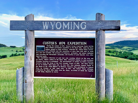 Crook County, Wyoming, USA - July 7, 2022: A historical roadside marker informs travelers of General George Armstrong Custer’s 1874 Expedition to the Black Hills.