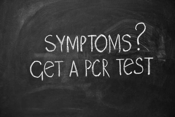 istock PCR - Polymerase Chain Reaction. Chalkboard lettering get a PCR test 1413298620