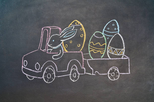 The hare carries Easter eggs in a car. Happy Easter stock photo