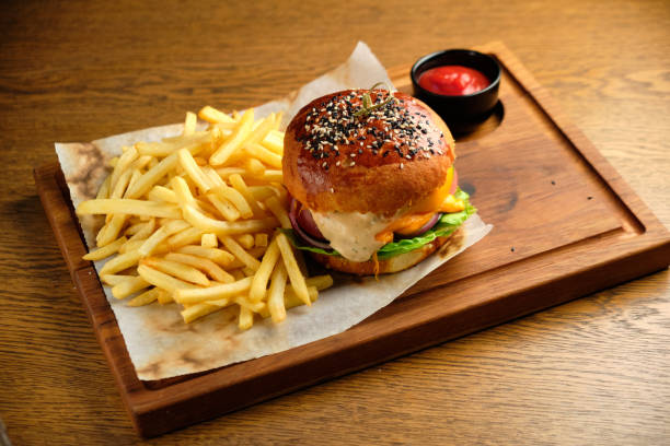 istock French fries next to a burger lying 1413305151