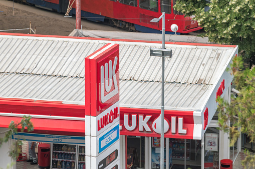 Belgrade, Serbia - June 7, 2022: Logos of Lukoil. Lukoil is one of the largest russian oil companies.