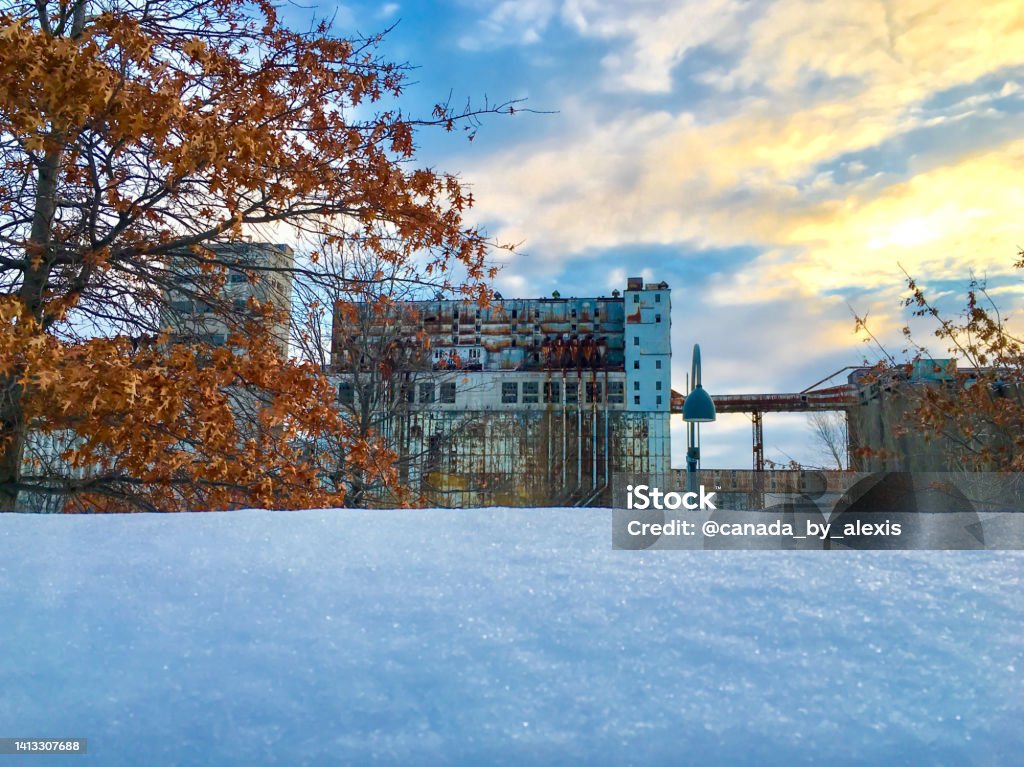 Abandoned Old Montreal - Vieux Montréal Abandoned factory in the old Port of Montréal at sunset in winter. Backgrounds Stock Photo