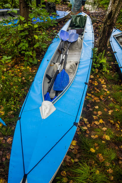 istock a blue long kayak with vessels 1413308357