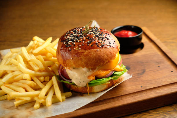 istock French fries next to a burger lying 1413309294