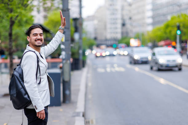 istock Trying to catch a taxi 1413317882