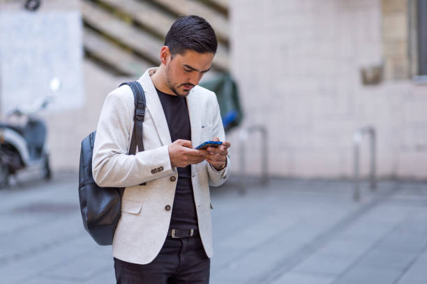 istock Just sending a text to my colleague 1413318017