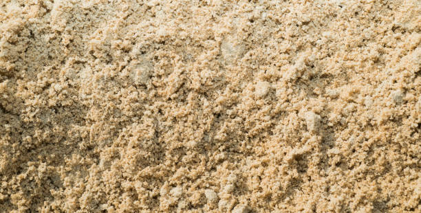 istock sand construction quarry. texture of sand for construction close-up 1413320121