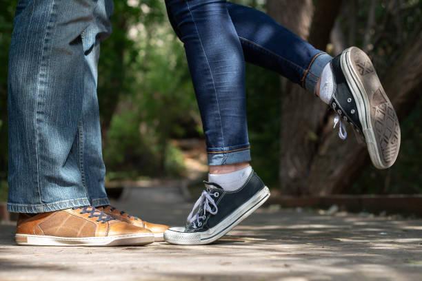 istock Kissing Shoes with heel pop 1413320436