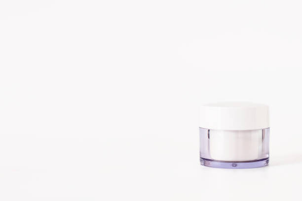 istock Glass cosmetic jar cream bottle with clipping path isolated on white background 1413323604