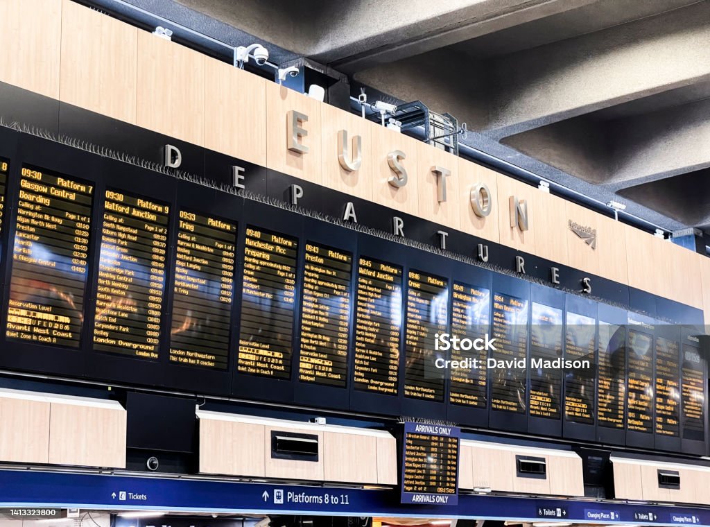 Train Schedule sign with departures and track numbers Euston Station, London Euston Station Stock Photo