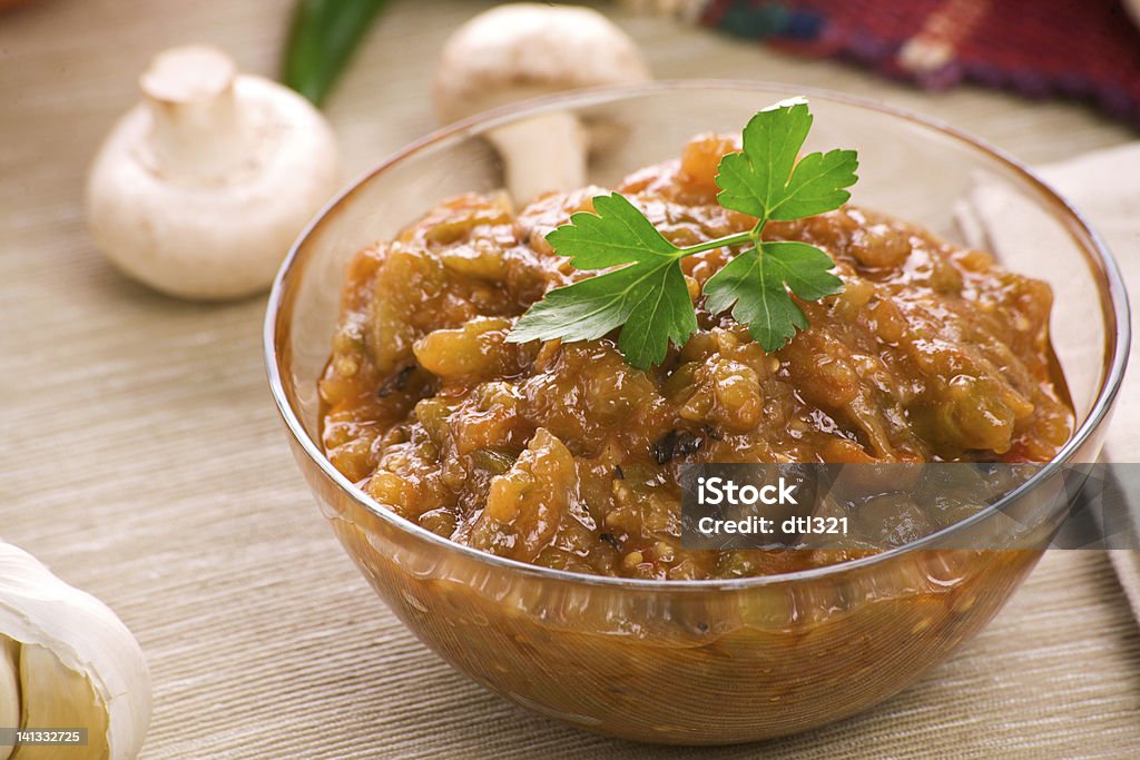 Bulgarian national dish "Kiopoolu" with roasted Aubergine, garlic and peppers Bulgarian national dish made from roasted eggplant , garlic, peppers and spices Beige Stock Photo