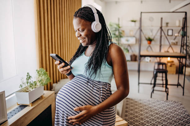 istock Woman using musical therapy for pregnancy 1413328203