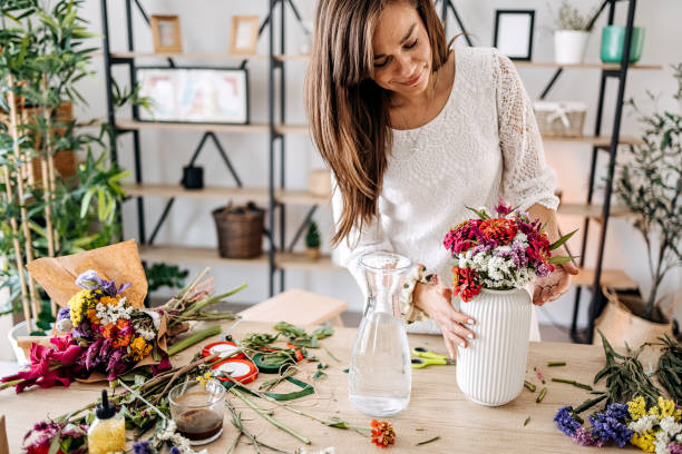 istock Woman making floral decorations 1413331102
