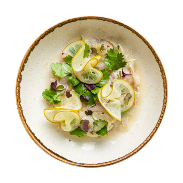 ceviche from dorado on plate isolated on white background top view