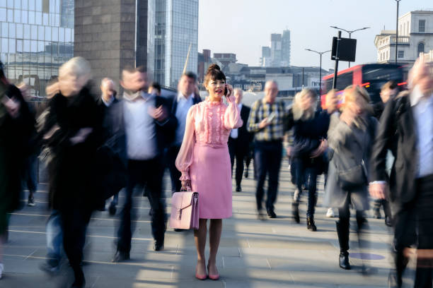 istock Morning commuters crossing London Bridge from Southwark 1413334634