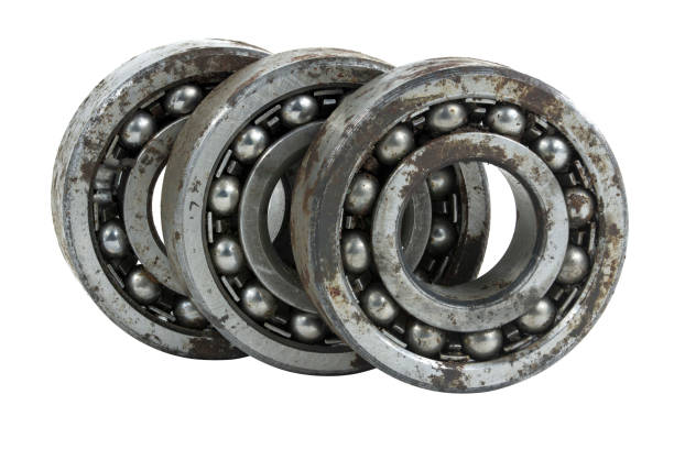 istock Bearing on a white background. Old worn bearing covered with rust 1413334737