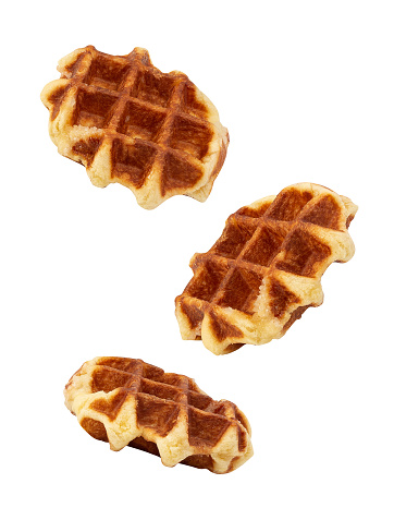 Falling Belgian Waffle isolated on white background with clipping path.