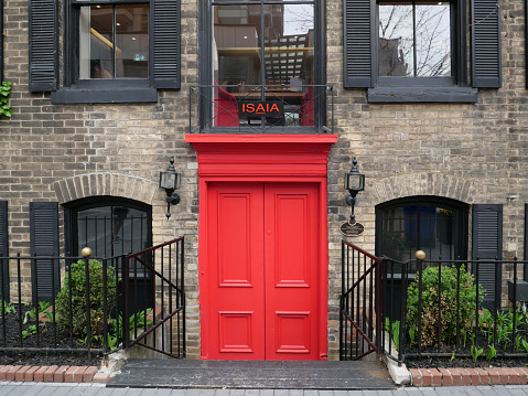 Toronto, Ontario, Canada - May 18, 2022:  old 19th century house in Yorkville district, converted into a boutique