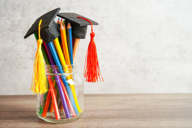 istock Colorful pencils in glass jar with copy space, learning university education concept. 1413355412