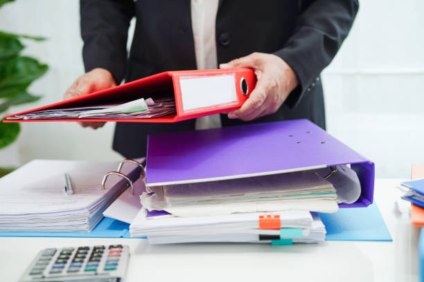 istock Business woman busy working with documents in office. 1413355624