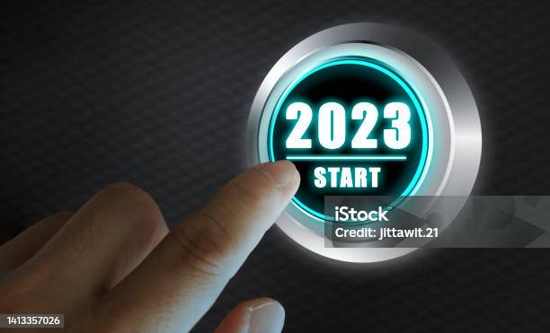Finger About To Press A Car Ignition Button With The Text 2023 Start Year Two Thousand And Twenty Three Concept Stock Photo - Download Image Now