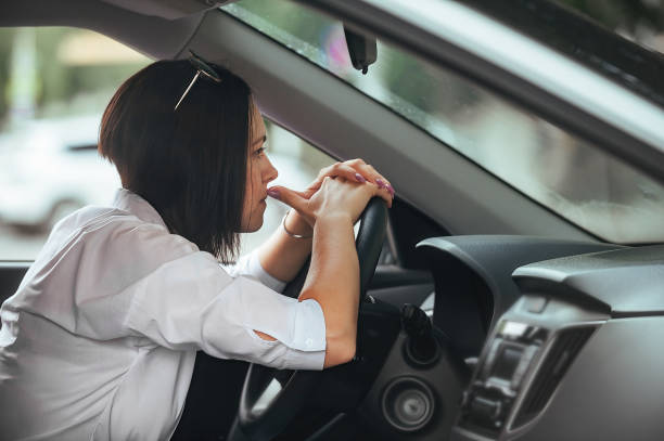 istock beautiful girl driver driving her car 1413373442