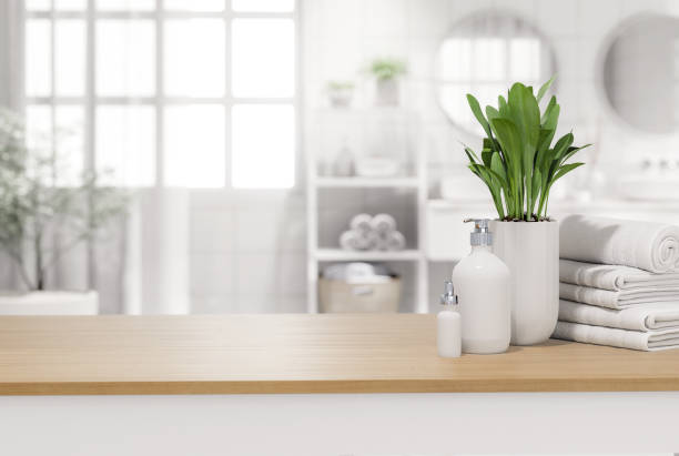 istock Empty wooden table top for copy space with blurry bathroom background 3d render 1413375075