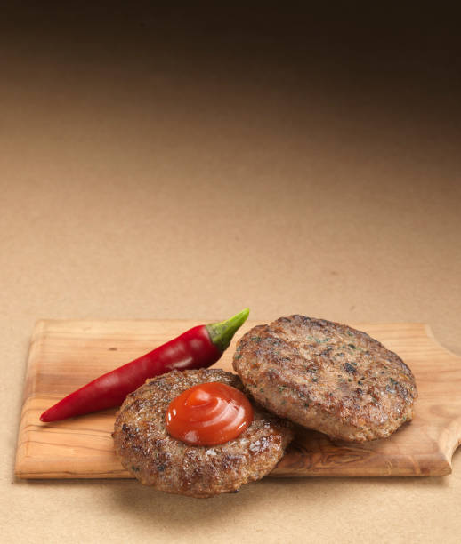 istock Meatball with sauce on wood. 1413379493