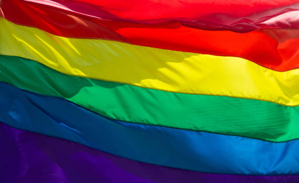 istock background with LGBT gay pride flag 1413379635