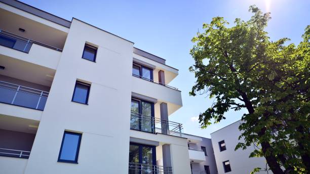 istock Modern luxury residential flat. Modern apartment building on a sunny day. 1413380919