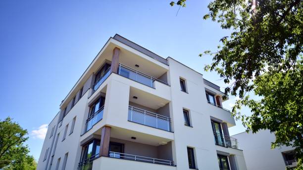 istock Modern luxury residential flat. Modern apartment building on a sunny day. 1413380980