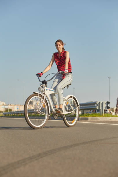istock woman on bike 1413384819