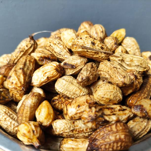 istock a bowl of fresh peanuts, still covered with the skin 1413386862