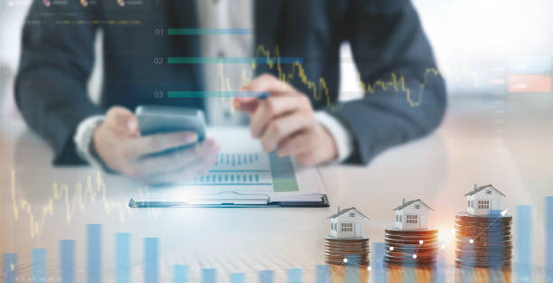 istock Businessman using mobile phone and analyzing financial, investment data ,business planning and strategy, real estate growth. 1413388410