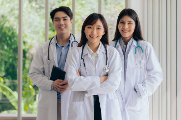 Portrait doctor healthcare professionals, Group asian doctor posing arm crossed stock photo