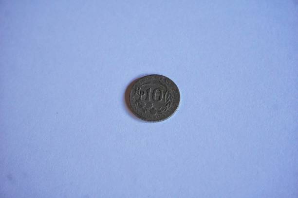 istock ten rupiah coin on white background 1413390627