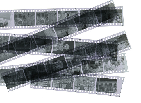 Background of of photohraphic negative films. Black and white strips.