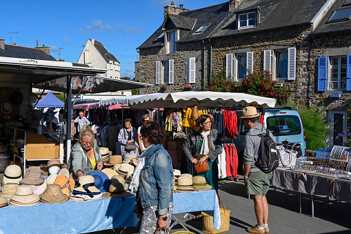 Pléneuf-Val-André, Brittany, France, July 5, 2022 - People on the weekly summer market of local producers and craftsmen in Pléneuf-Val-André, Brittany