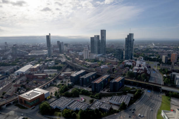 istock Manchester City Centre Drone Aerial View Above Building Work Skyline Construction Blue Sky Summer Beetham Tower 1413395281