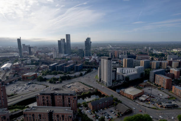 istock Manchester City Centre Drone Aerial View Above Building Work Skyline Construction Blue Sky Summer Beetham Tower 1413395286