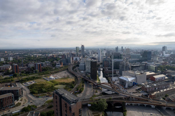 istock Manchester City Centre Drone Aerial View Above Building Work Skyline Construction Blue Sky Summer Beetham Tower 1413395287