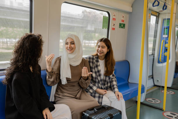 istock Multi-ethnic business people travel by train. 1413396702
