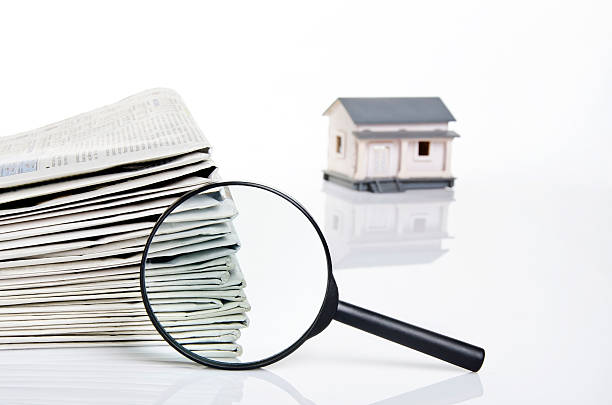 istock searching for a home on newspapers 141339695