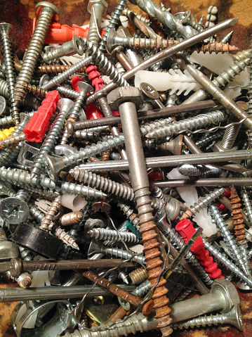 Used construction nails and mounting hardware