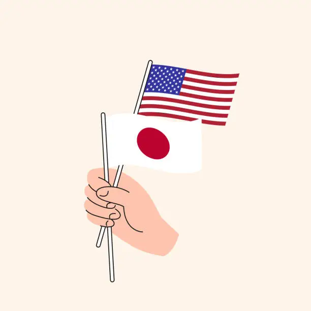 Vector illustration of Cartoon Hand Holding United States And Japanese Flags. America and Japan Relations.