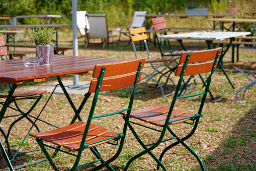 closeup of a table with chairs took on sunny summer day..